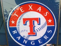 Framed Felt Texas Rangers logo, autographed by Eric Hurley